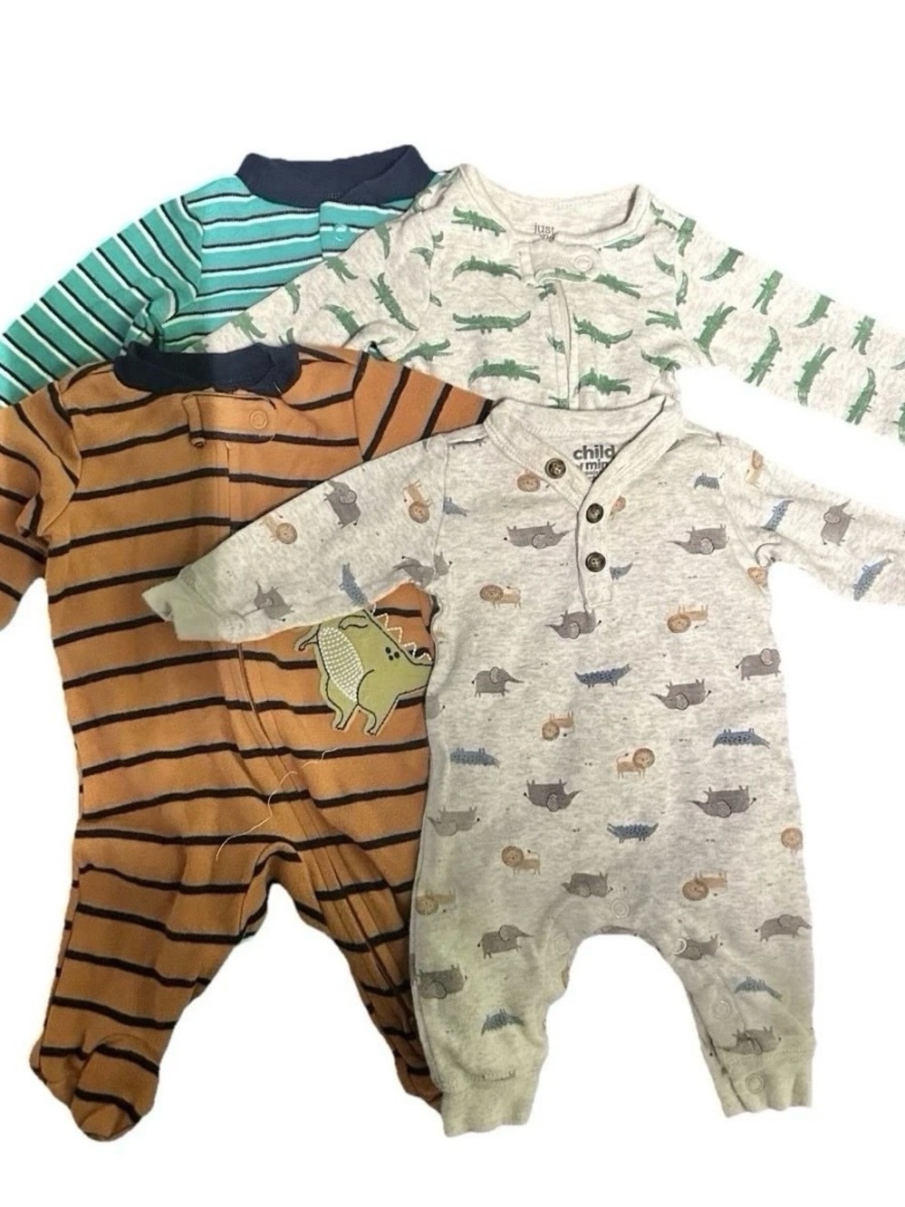 Lot Of 4 Boy’s Footie Pajamas Size Newborn